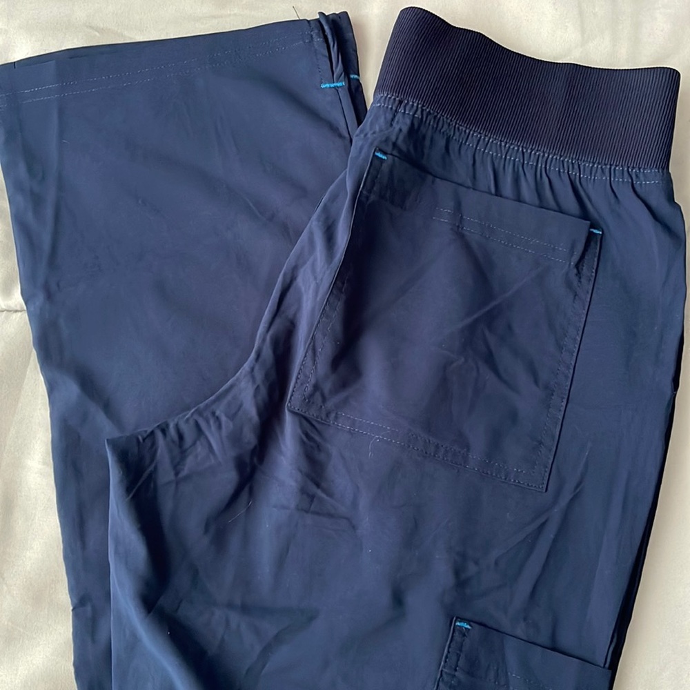 Brand new without tags Koi scrub pants. XXS length is regular